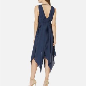 BCBG maxazaria dark navy gown. New with tags. Beautiful flowing fabric.